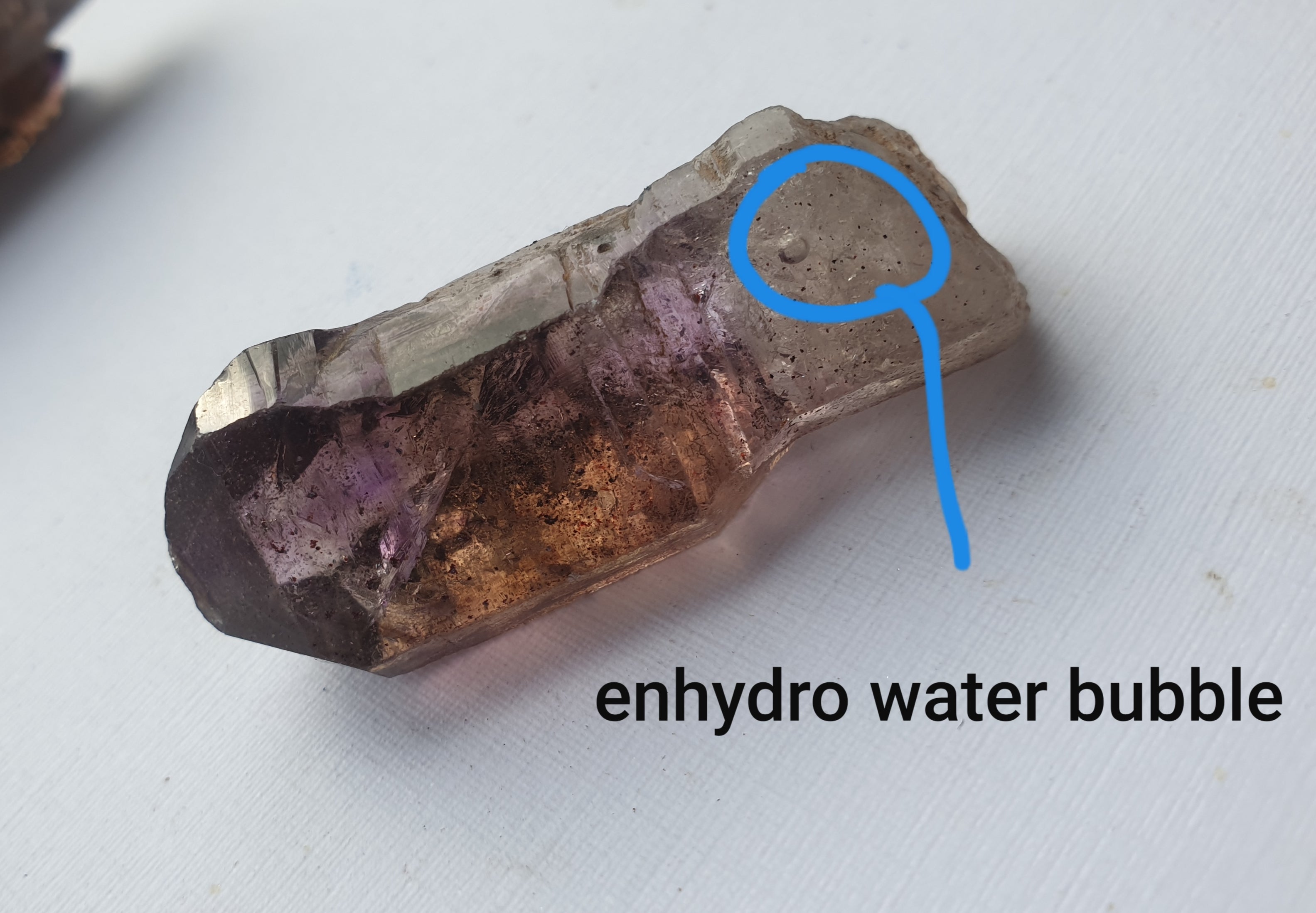 Super seven Amethyst - sceptor point with enhydro water bubble - 26grams